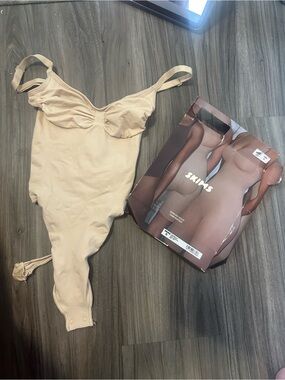 SKIMS Beige One-Piece Bodysuit with Adjustable Straps